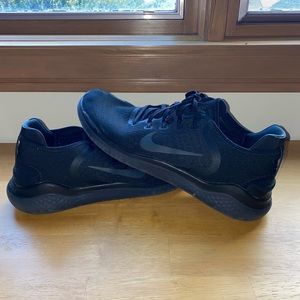 Nike Free Run Shoes. Almost new. I wore these about 5 times over 2 years ago.